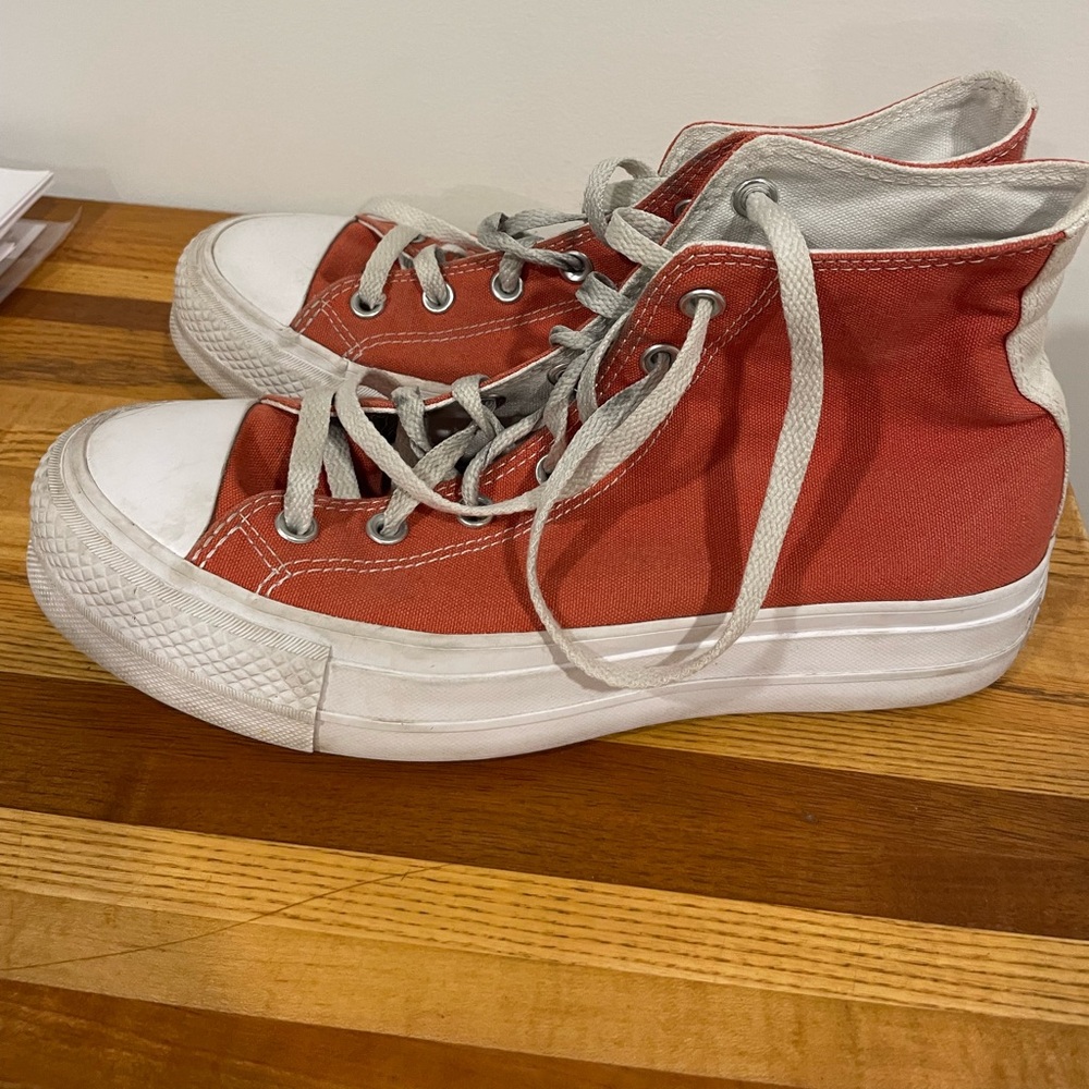 Customer orange converse high top